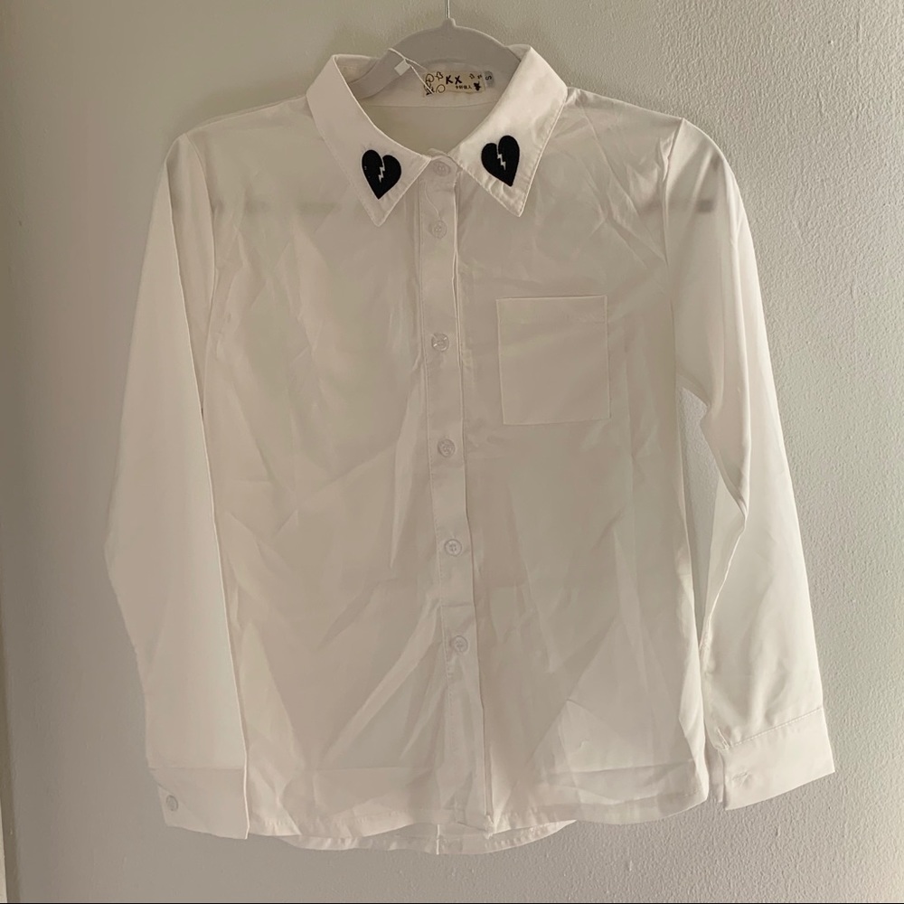 white shirt with heartbreak print